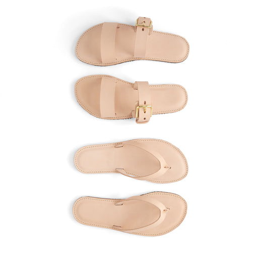 Set of beige sandals with a buckle on a white background made by using a pattern
