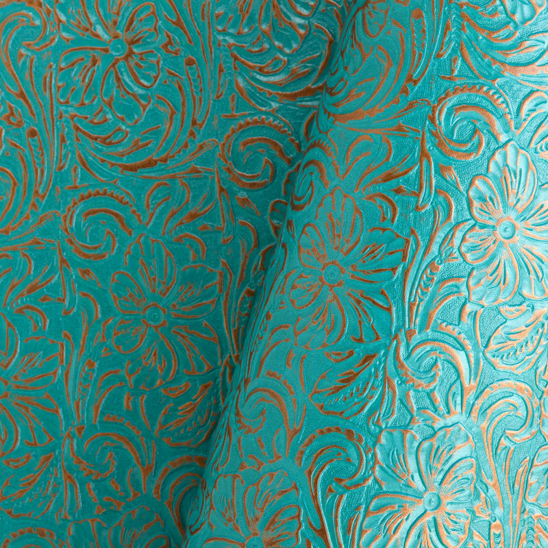 Turquesa metálico con relieve floral y un solo hombro
